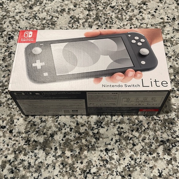 Nintendo Switch Lite in Gray - Picture 1 of 3